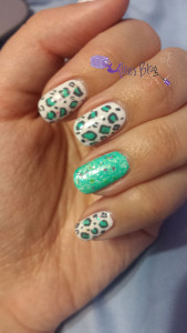 turquoise leopard print nails | sally hansen